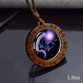 Load image into Gallery viewer, Libra zodiac star sign glass and wood pendant necklace on faux leather cord
