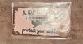 Load image into Gallery viewer, A Dachshund Lives Here Hangable Wooden Sign
