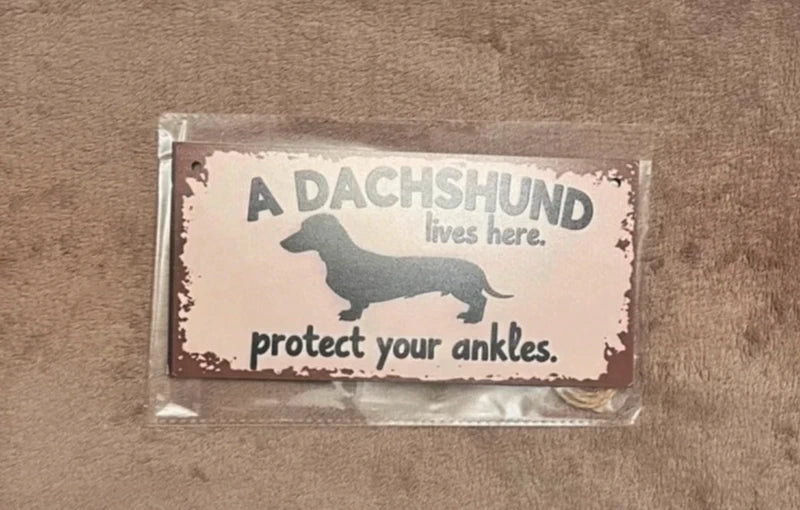 A Dachshund Lives Here Hangable Wooden Sign