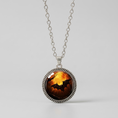 Load image into Gallery viewer, Black & orange pendant necklace 3cm on stainless steel chain
